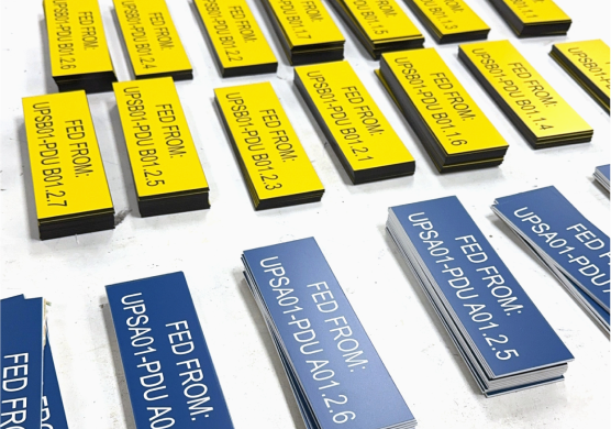 Custom engraved phenolic and aluminum industrial labels and tags